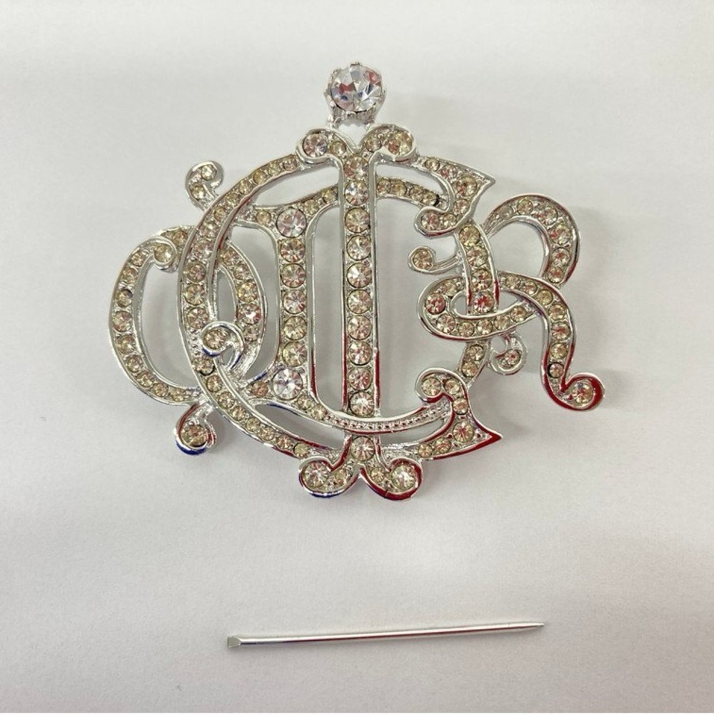 Christian Dior monogram crystal brooch